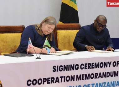 Jeanne Clark US and Tanzania Mohammed Mchengerwa sign MOU health cooperation