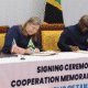 Jeanne Clark US and Tanzania Mohammed Mchengerwa sign MOU health cooperation