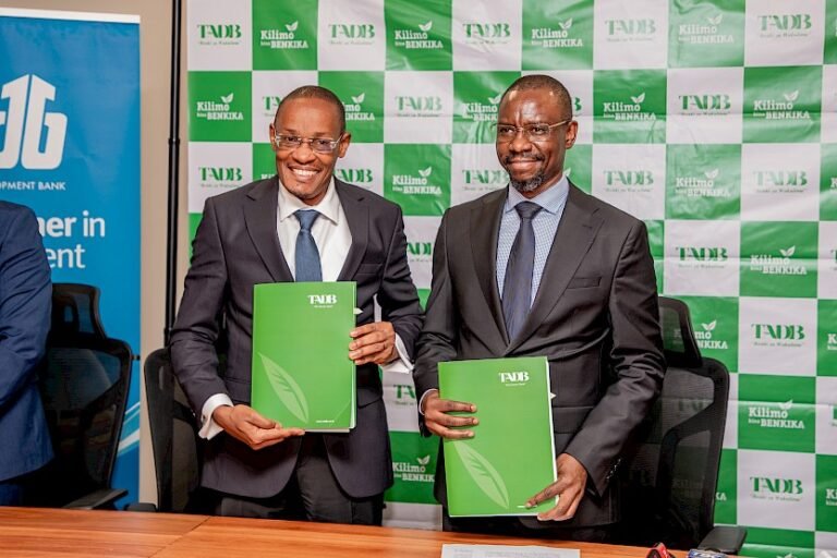 EADB Acting Director General Benard Mono and TADB Managing Director Frank Nyabundege at the signing of the TZS 50 billion financing facility