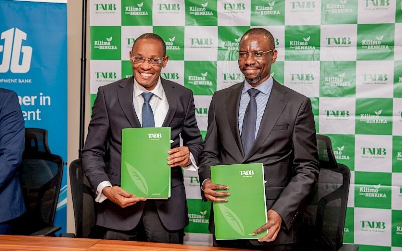 EADB Acting Director General Benard Mono and TADB Managing Director Frank Nyabundege at the signing of the TZS 50 billion financing facility